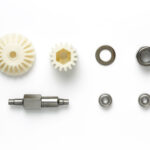 Tamiya 47395      TA02 Center One-Way Set