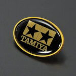 Tamiya 67510 Oval Lapel Pin (Black/Gold)